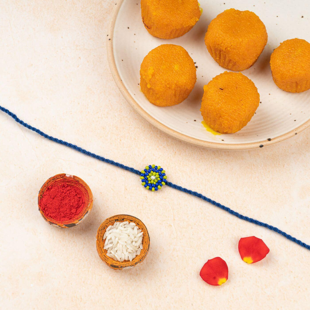 Handcrafted Glass Beads Chaand Rakhi With Roli Chawal