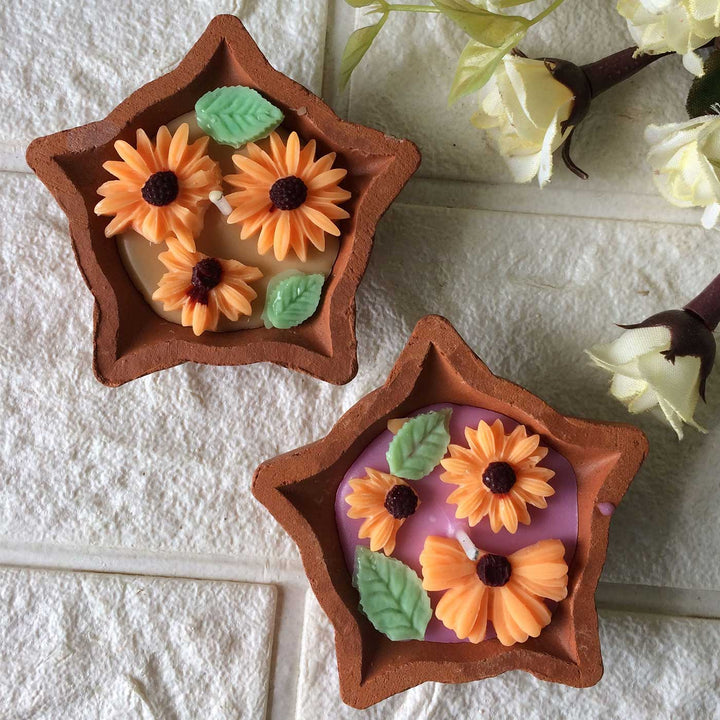 Handmade Orange Floral Diya Shaped Terracotta Candle