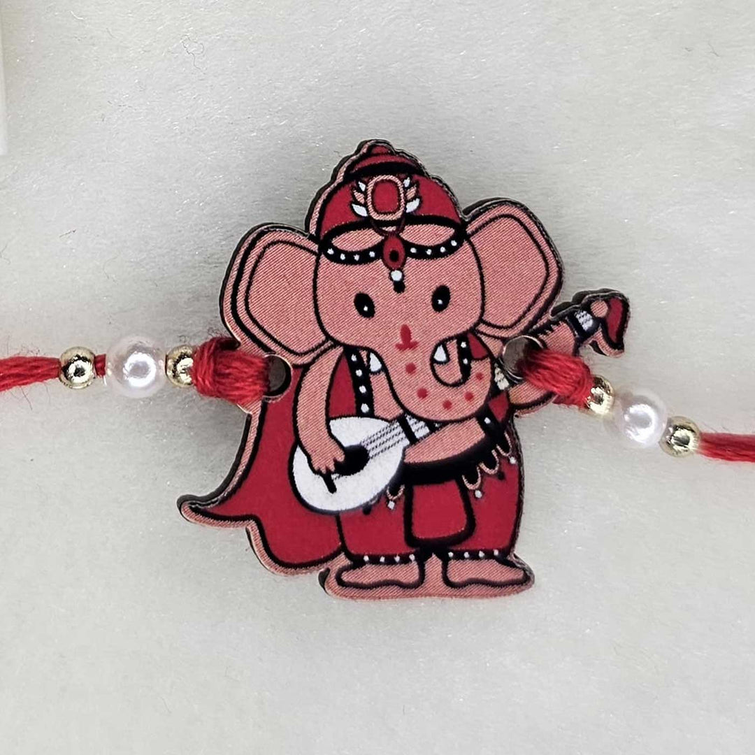 Handmade Ganesha with Guitar MDF Wood Kids Rakhi With Roli Chawal