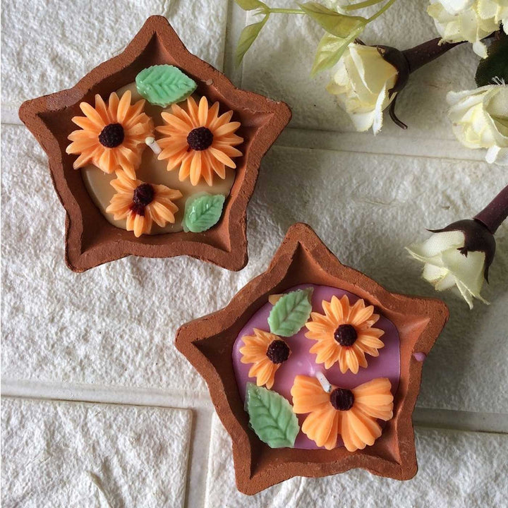 Handmade Orange Floral Diya Shaped Terracotta Candle