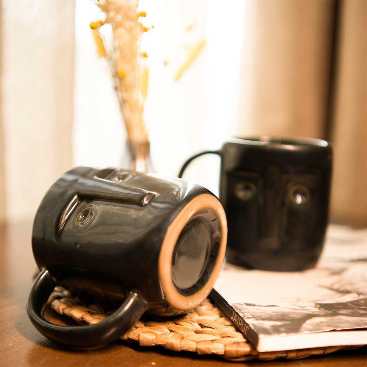 Black Sculpted Face Ceramic Mugs | Set Of 2