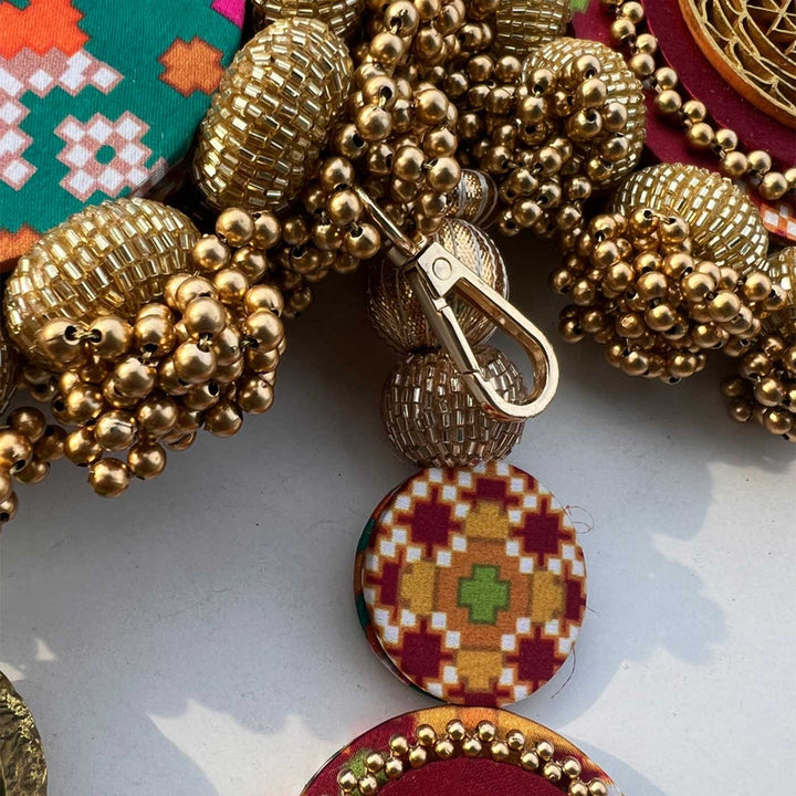 Handmade Rasam Rivaaj Motif Maroon And Bottle Green Navratna Reversible Toran