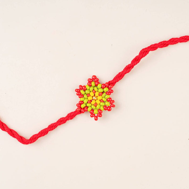 Handcrafted Glass Beads Phool Rakhi With Roli Chawal