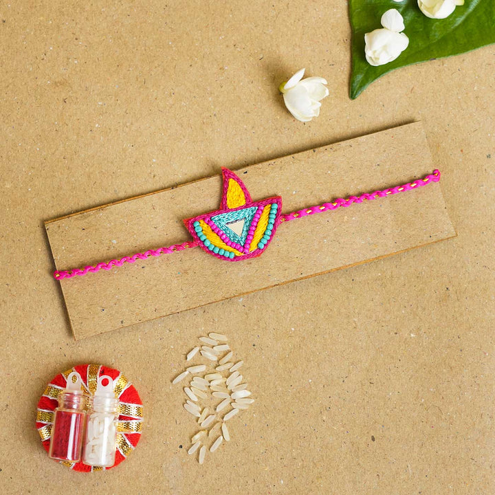 Handmade Beaded Diya Rakhi With Roli Chawal