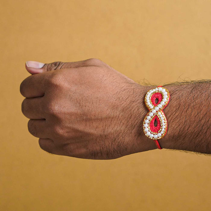 Handmade Beaded Infinity Rakhi With Roli Chawal