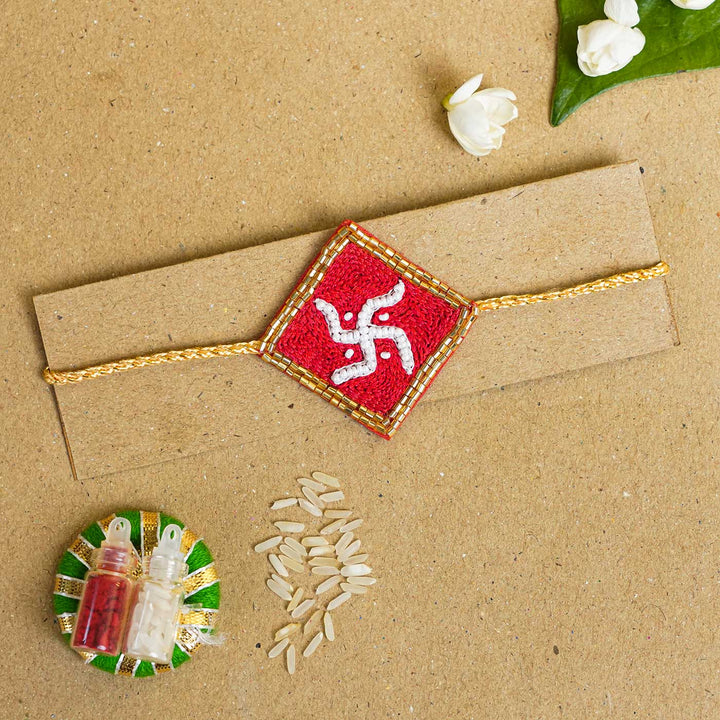 Handmade Beaded Swastik Rakhi With Roli Chawal