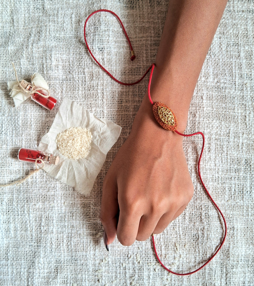 Handmade Papier Mache Naquashi Red Rakhi With Roli Chawal