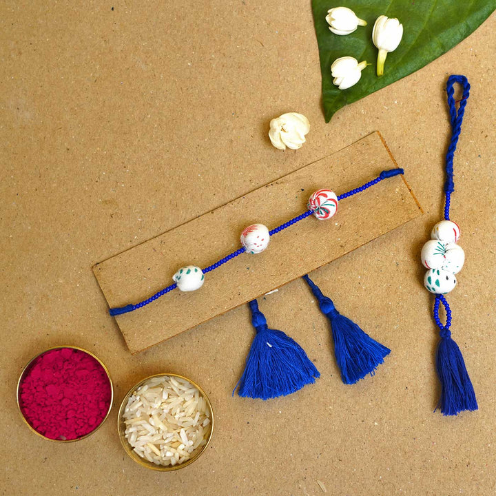 Handmade Shweth Potli Upcycled Fabric Bhaiya Bhabhi Rakhi With Roli Chawal | Set of 2