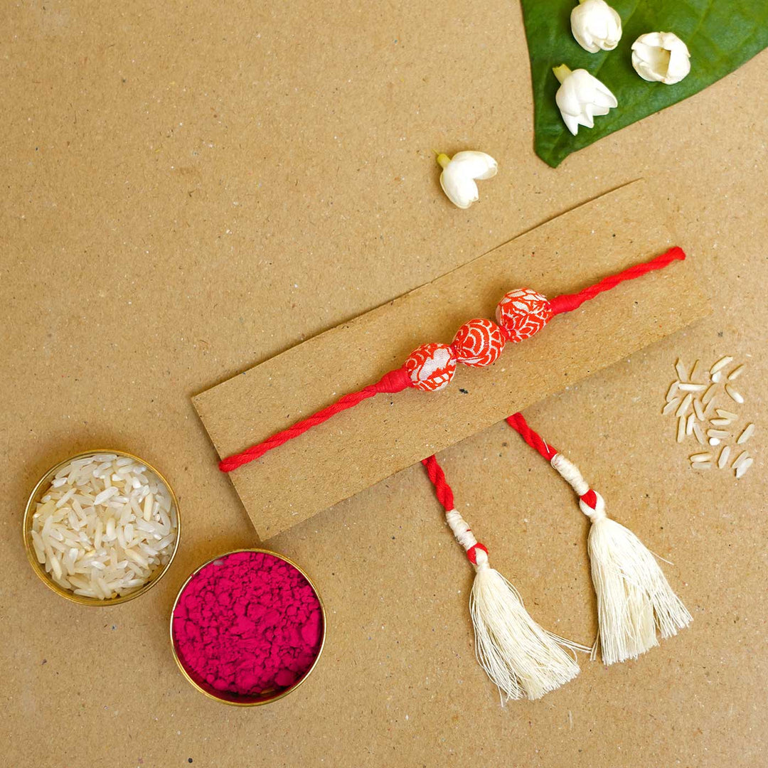 Handmade Red Upcycled Fabric  Rakhi  With Roli Chawal