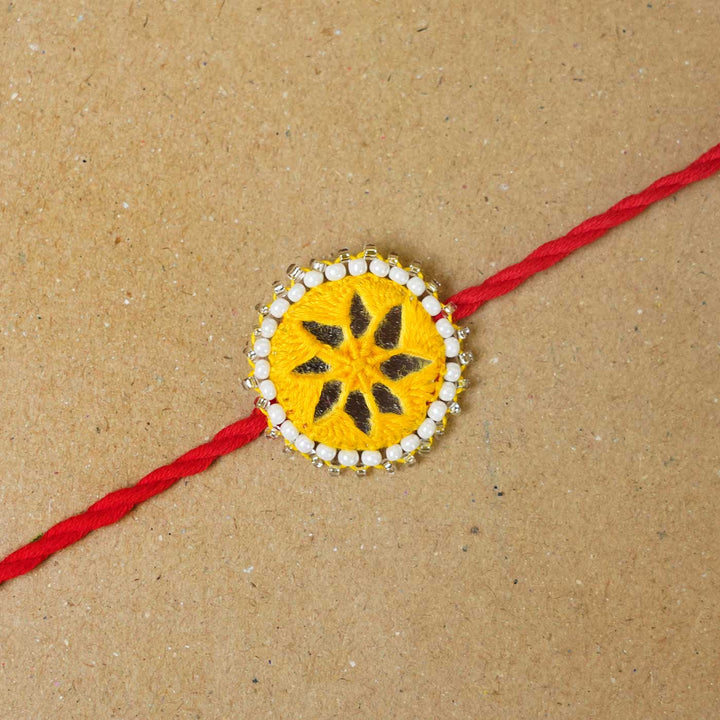 Handmade Mirror Work Kajal Yellow-Red Rakhi  With Roli Chawal