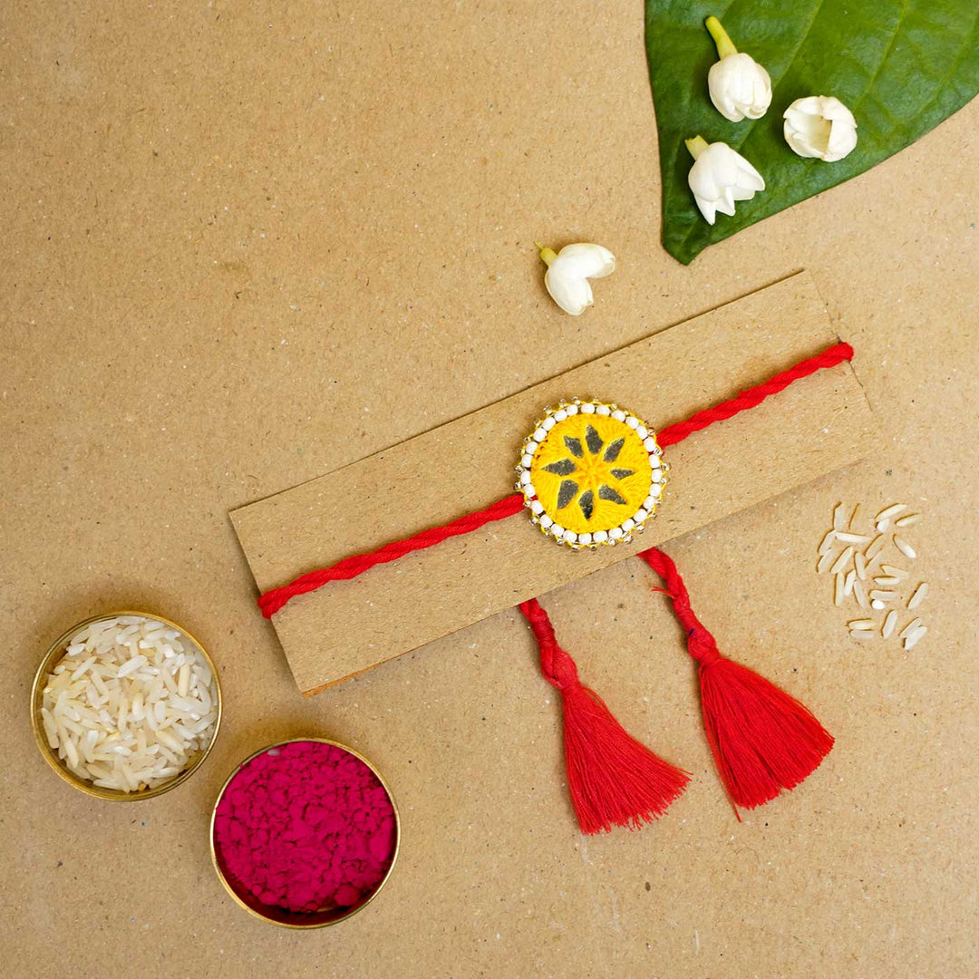 Handmade Mirror Work Kajal Yellow-Red Rakhi  With Roli Chawal