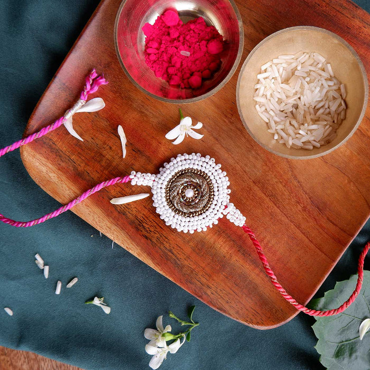 Handmade Zardozi White Bead Border Rakhi With Wooden Box & Roli Chawal