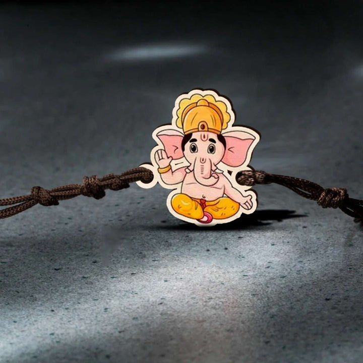 Handmade Ganesha Wooden Rakhi With Roli Chawal