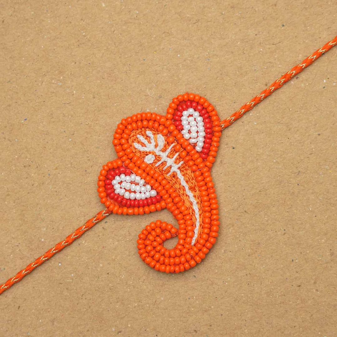 Handmade Beaded Ganpati Rakhi With Roli Chawal