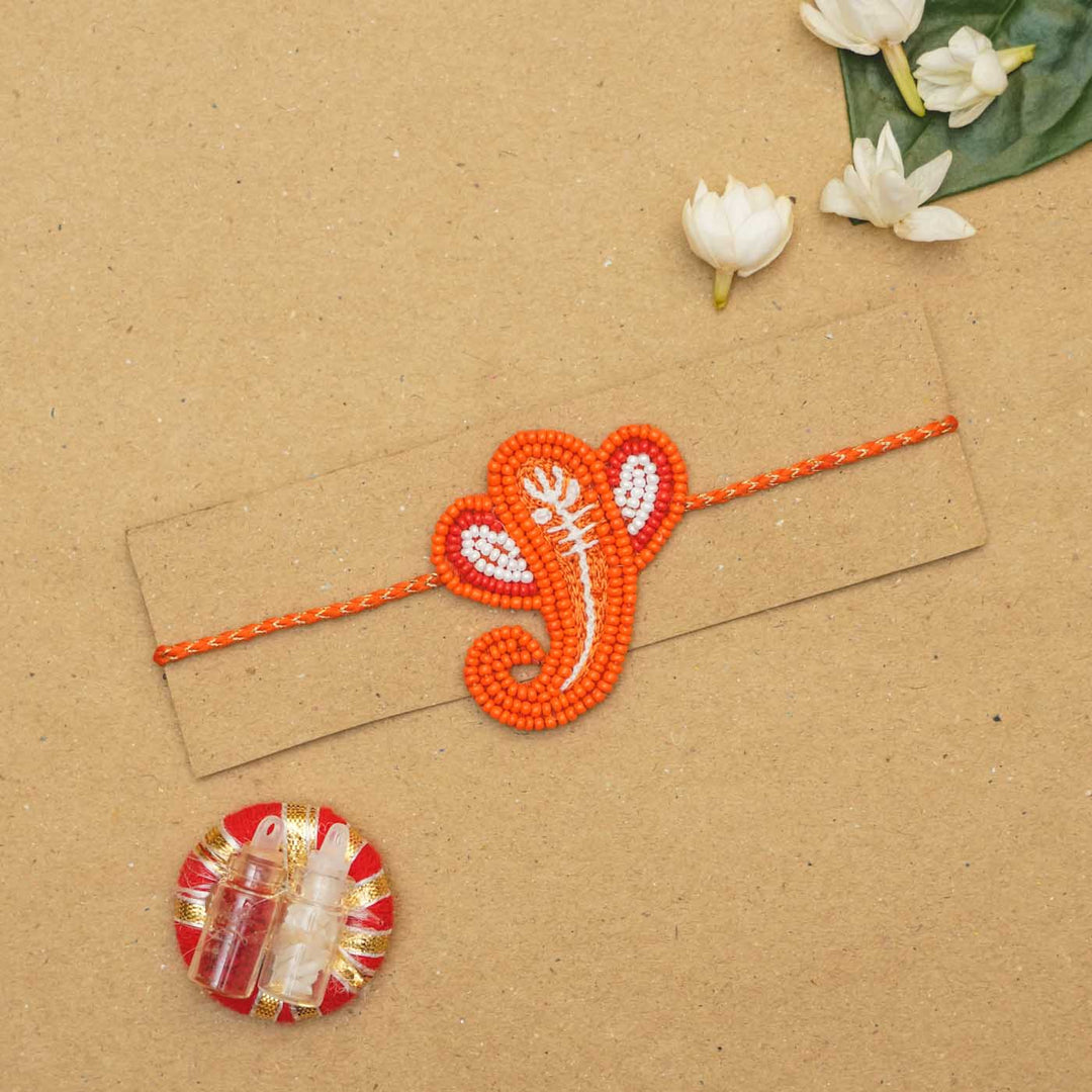 Handmade Beaded Ganpati Rakhi With Roli Chawal