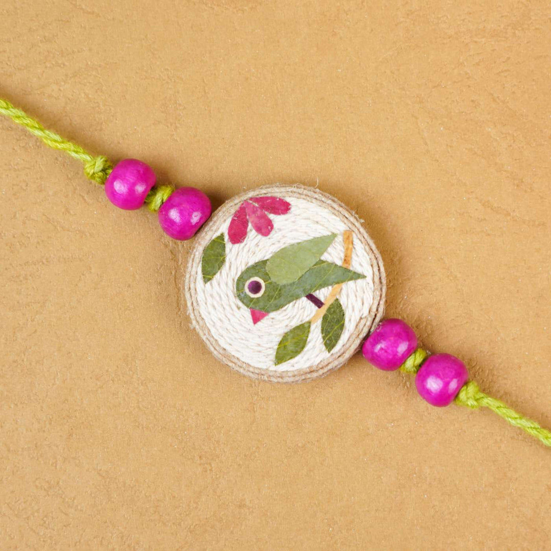 Handmade Eco-friendly Tota Pressed Flower Rakhi with Roli Chawal