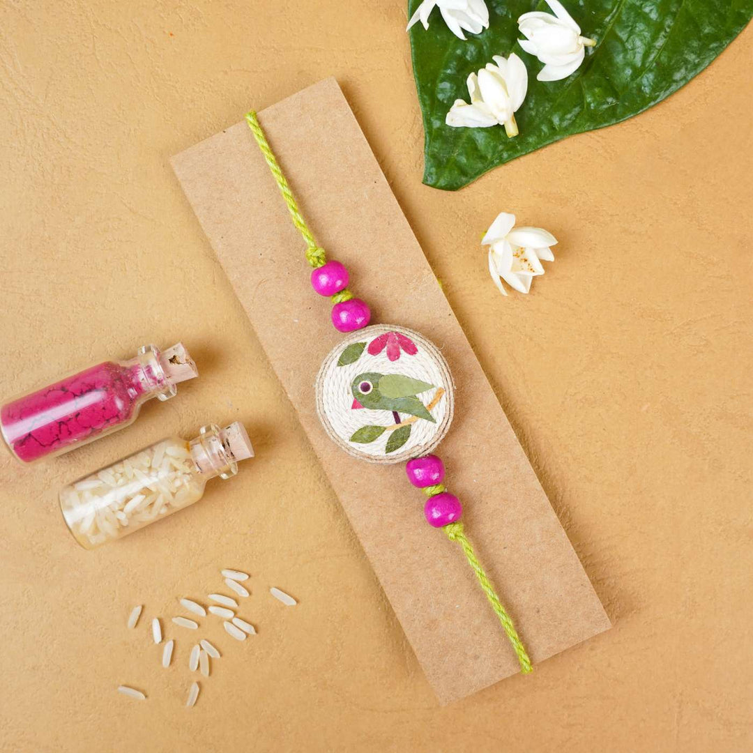 Handmade Eco-friendly Tota Pressed Flower Rakhi with Roli Chawal