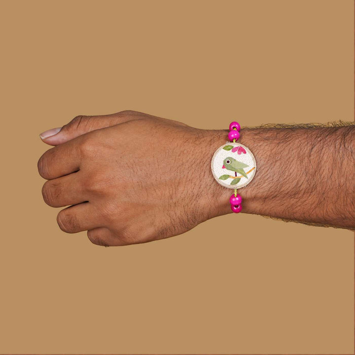 Handmade Eco-friendly Tota Pressed Flower Rakhi with Roli Chawal