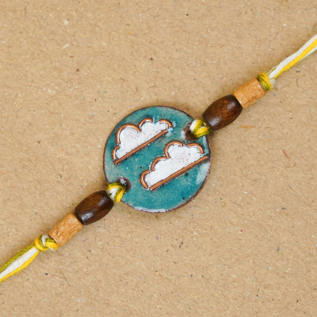 Handmade Baadal Blue Copper Enamel Rakhi With Chocolates & Roli Chawal