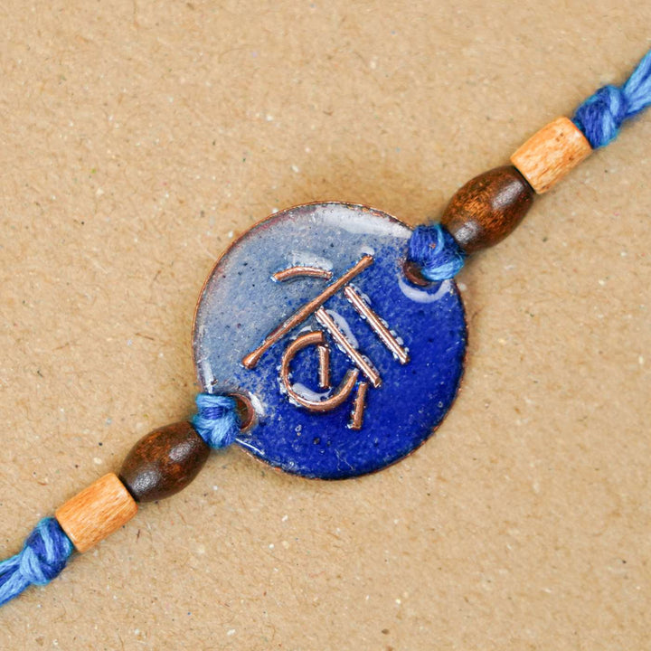 Handmade Bro Blue Copper Enamel Rakhi With Chocolates & Roli Chawal