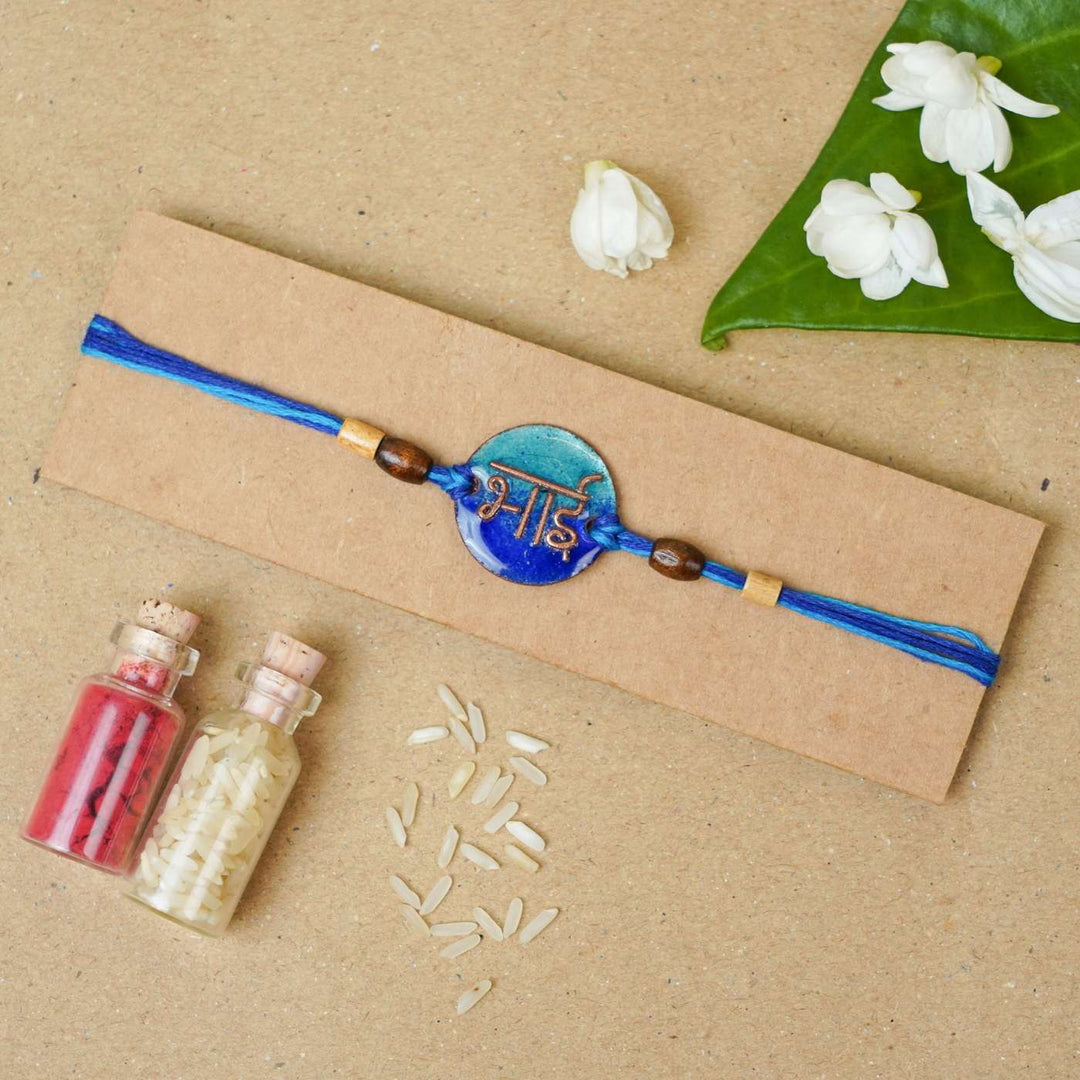 Handmade Bhai Blue Copper Enamel Rakhi With Chocolates & Roli Chawal