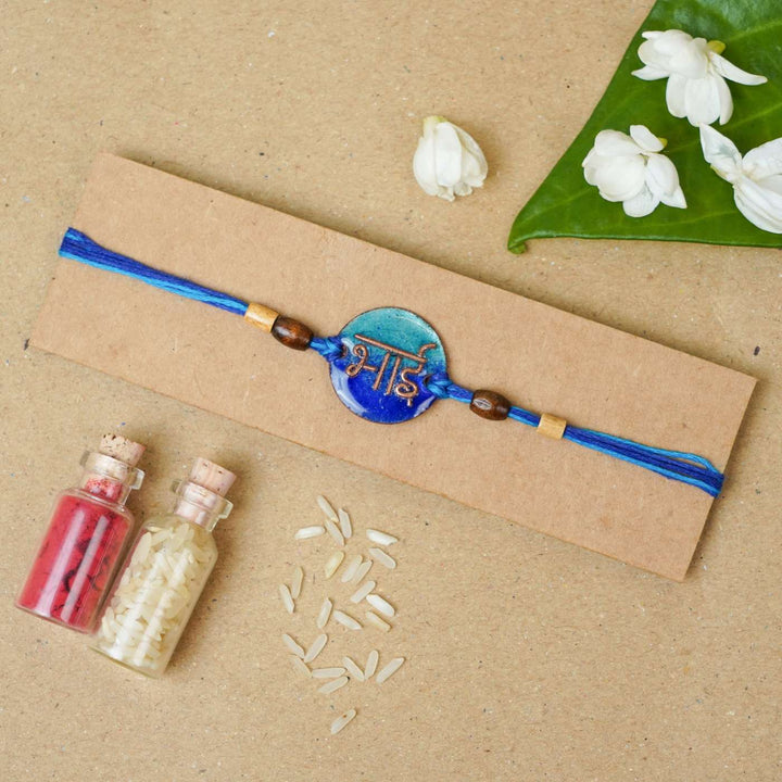 Handmade Bhai Blue Copper Enamel Rakhi With Chocolates & Roli Chawal