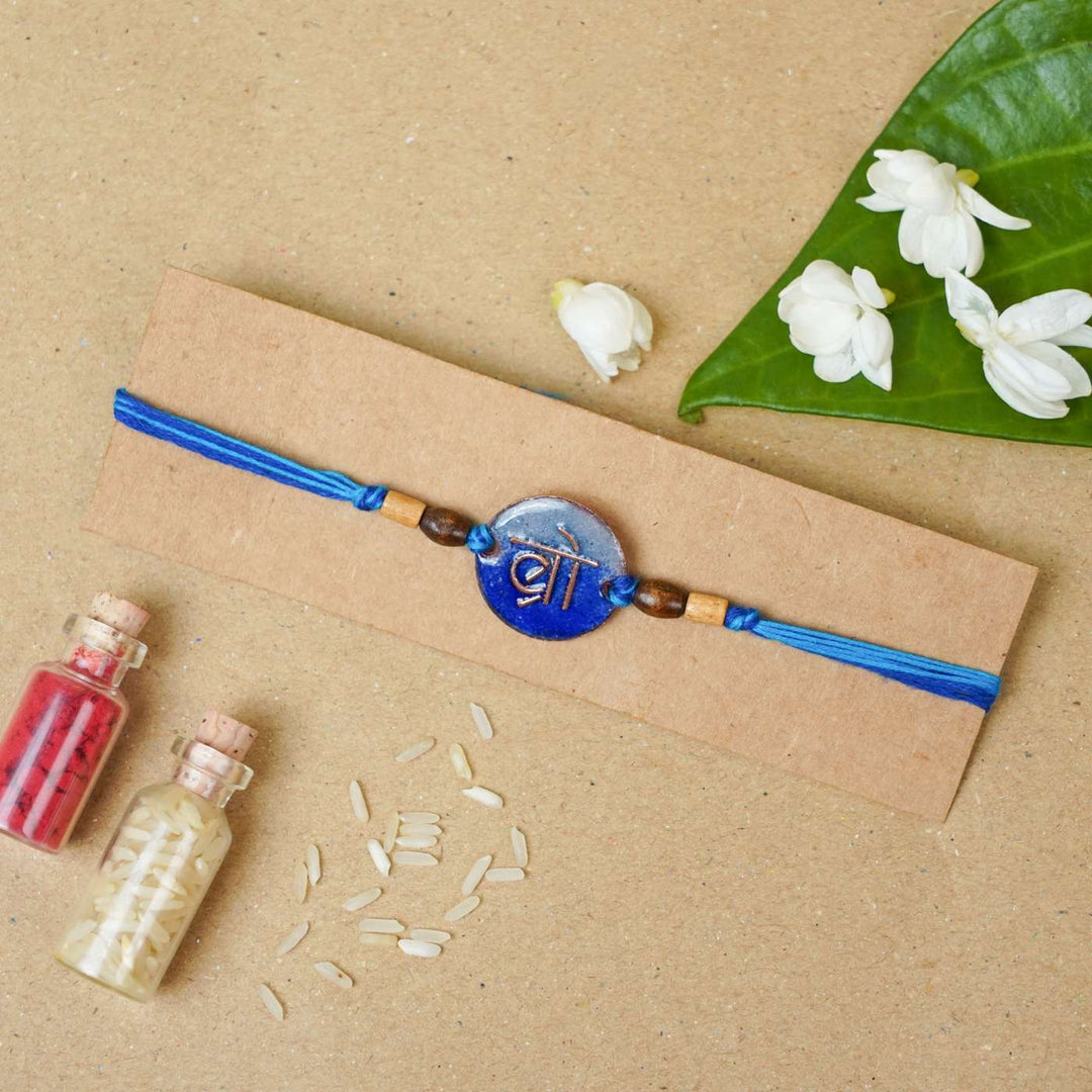 Handmade Bro Blue Copper Enamel Rakhi With Chocolates & Roli Chawal