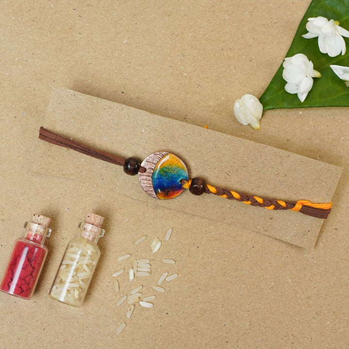 Handmade Indraa Textured Multicolour Copper Enamel Rakhi With Chocolates & Roli Chawal