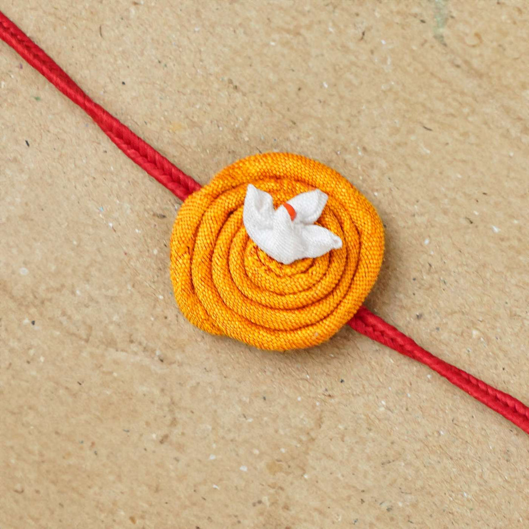 Handmade Rangoli Upcycled Fabric Rakhi With Roli Chawal