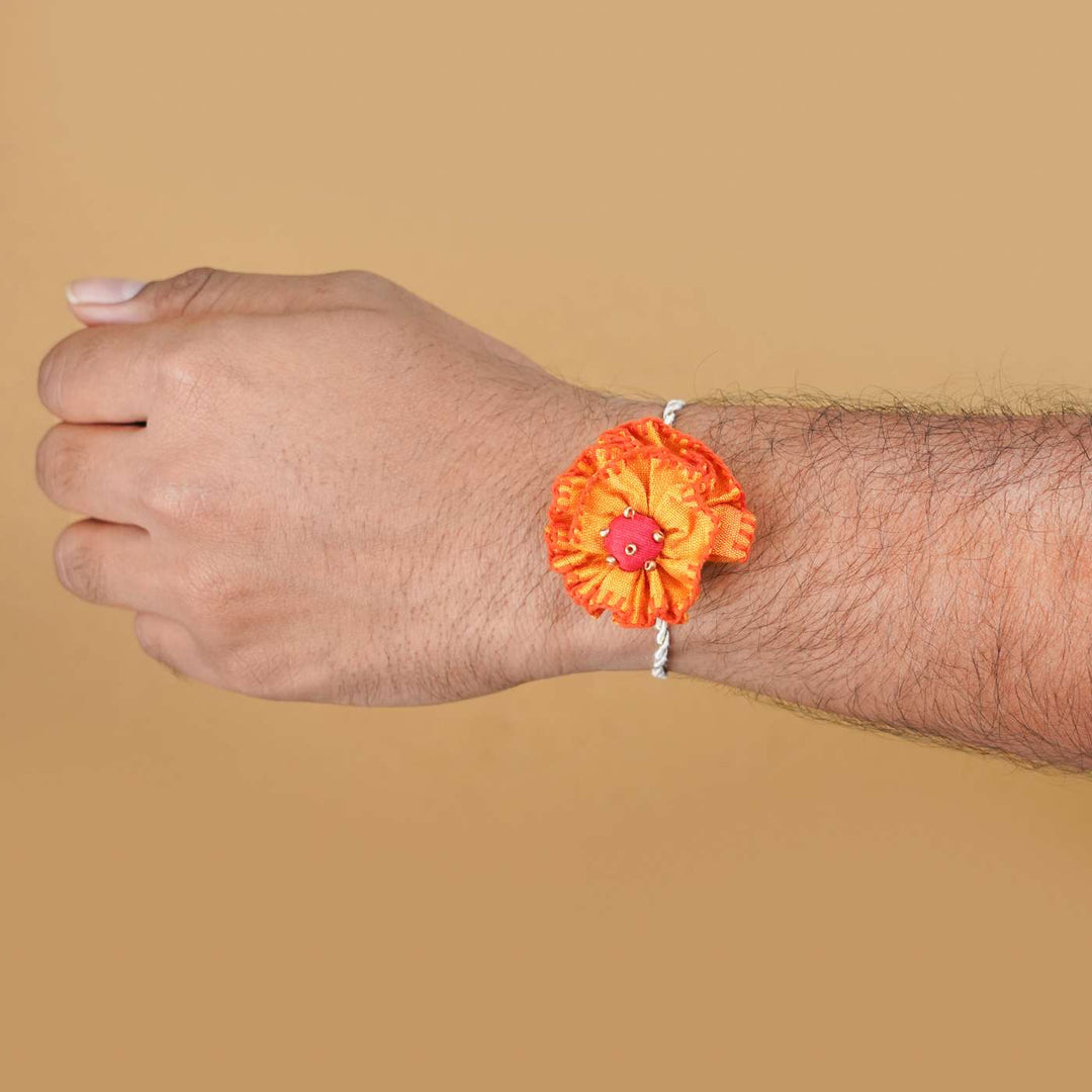 Handmade Genda Phool Upcycled Fabric Rakhi With Roli Chawal