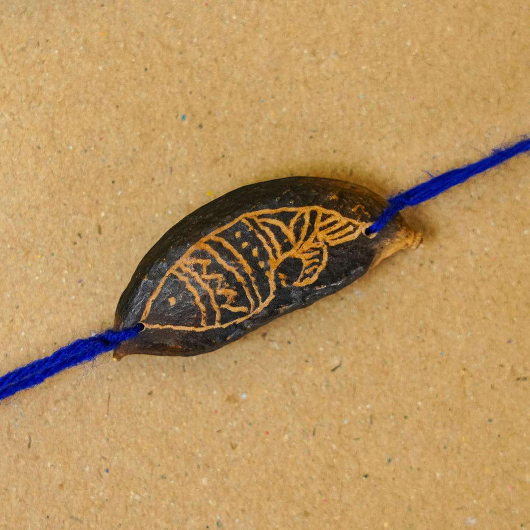 Handmade Plantable Blue Fish Seed Rakhi With Roli Chawal