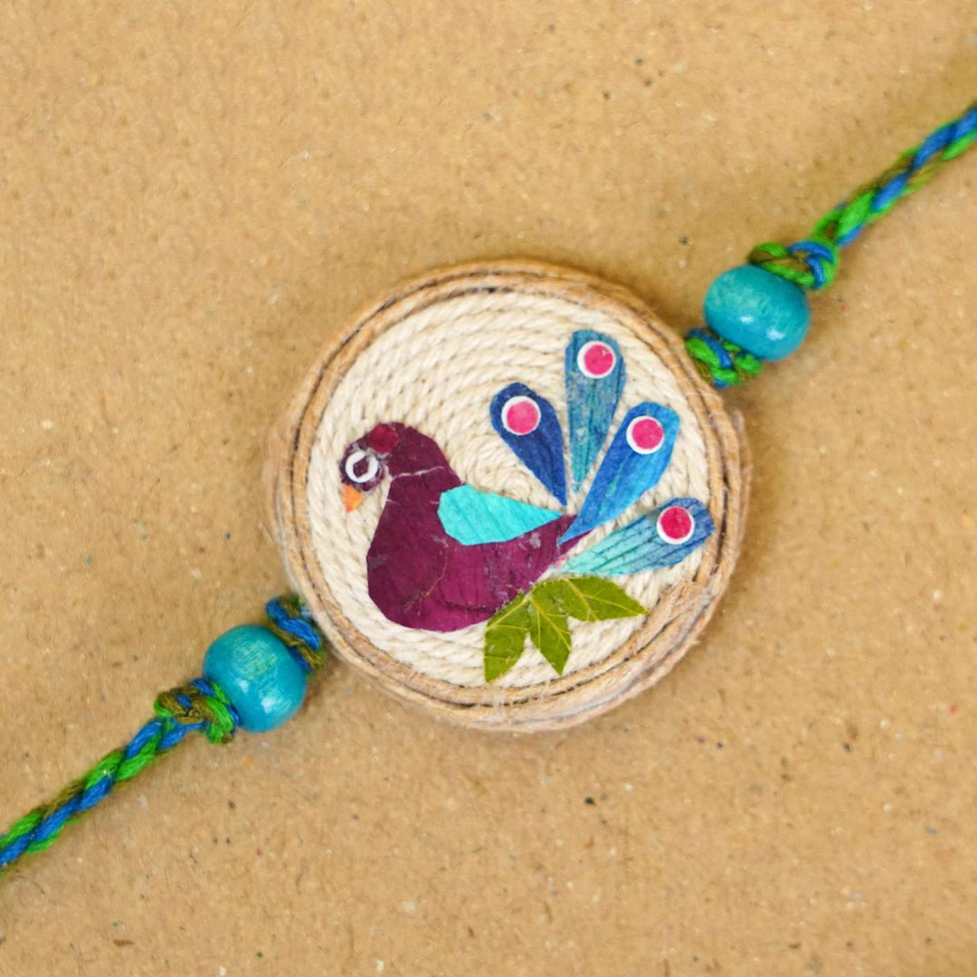 Handmade Pressed Flower Art Peacock Jute Rakhi With Roli Chawal