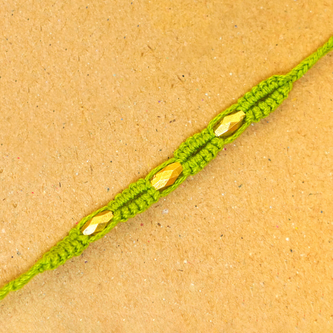 Handmade Macrame Three Gold Beaded Rakhi With Roli Chawal