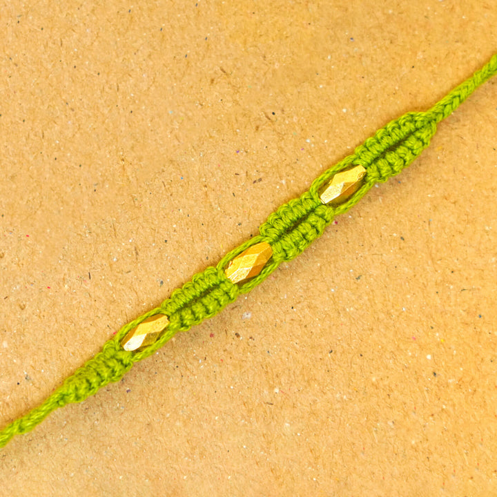 Handmade Macrame Three Gold Beaded Rakhi With Roli Chawal