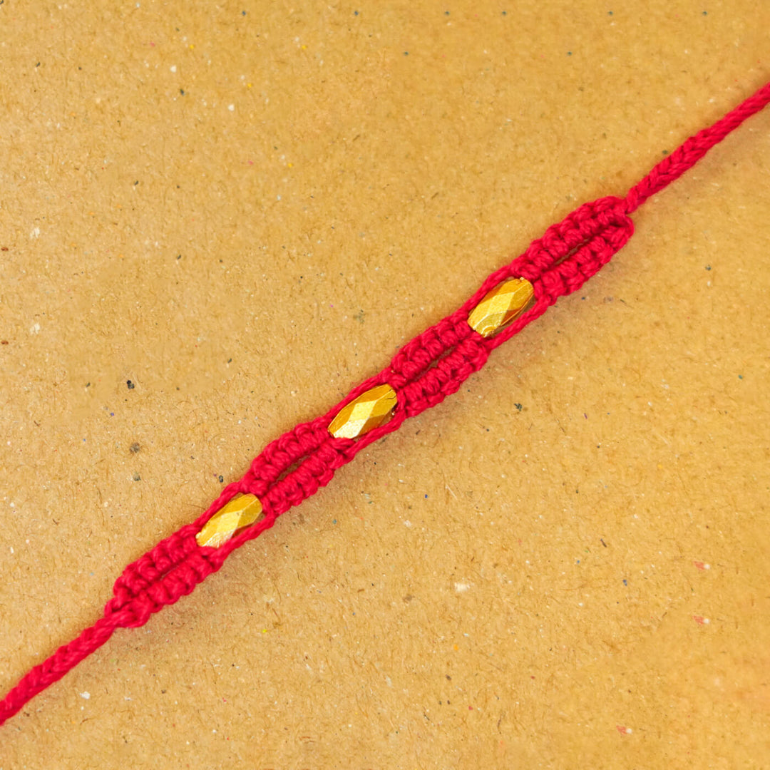 Handmade Macrame Three Gold Beaded Rakhi With Roli Chawal