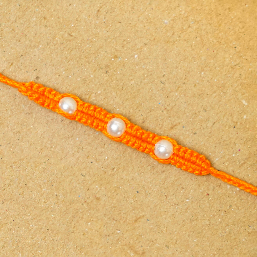 Handmade Macrame Three Pearl Rakhi With Roli Chawal