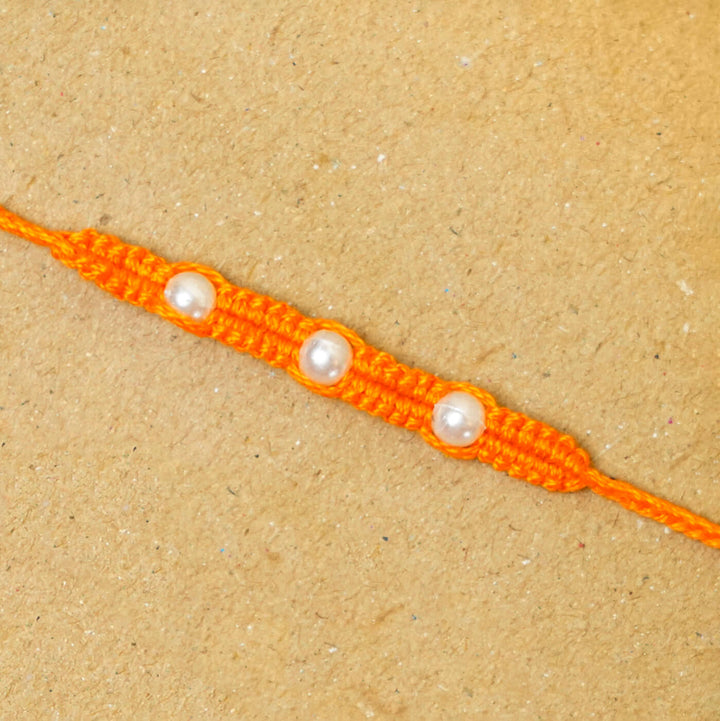 Handmade Macrame Three Pearl Rakhi With Roli Chawal