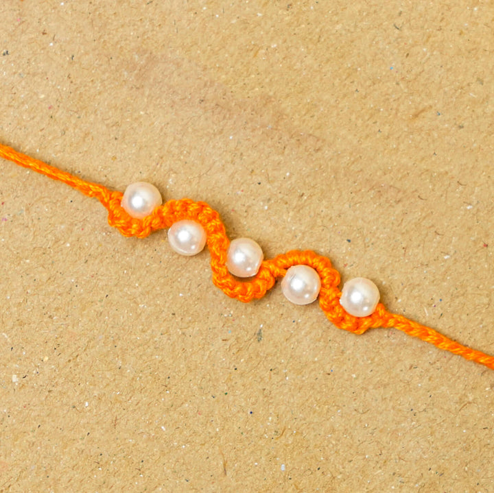 Handmade Macrame Five Pearl Rakhi With Roli Chawal