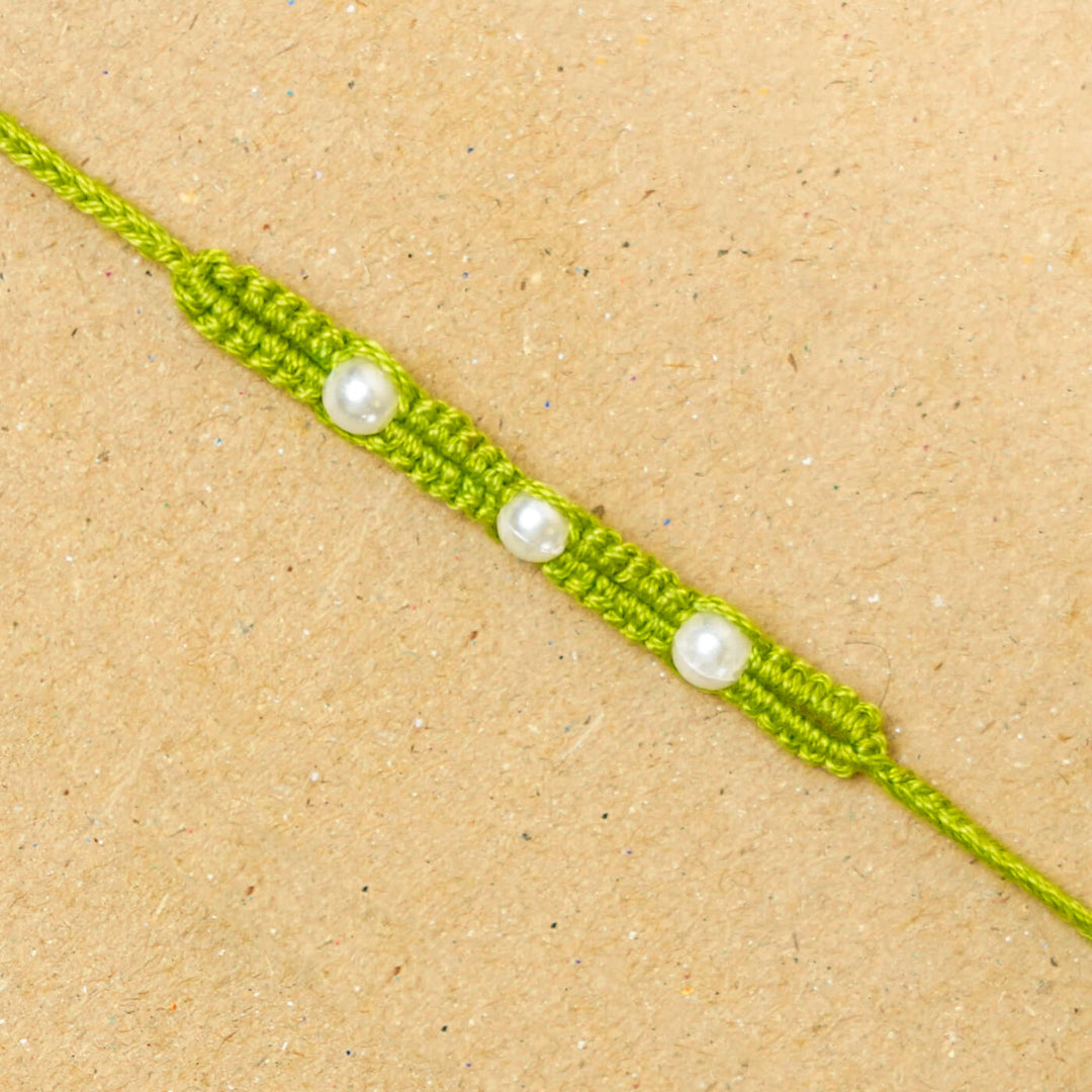 Handmade Macrame Three Pearl Rakhi With Roli Chawal