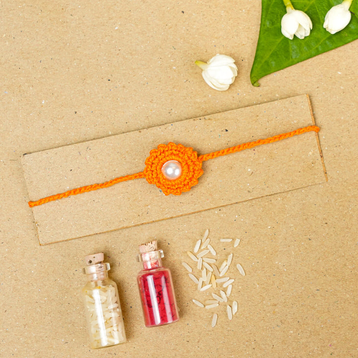 Handmade Crochet Round Pearl Cotton Rakhi With Roli Chawal