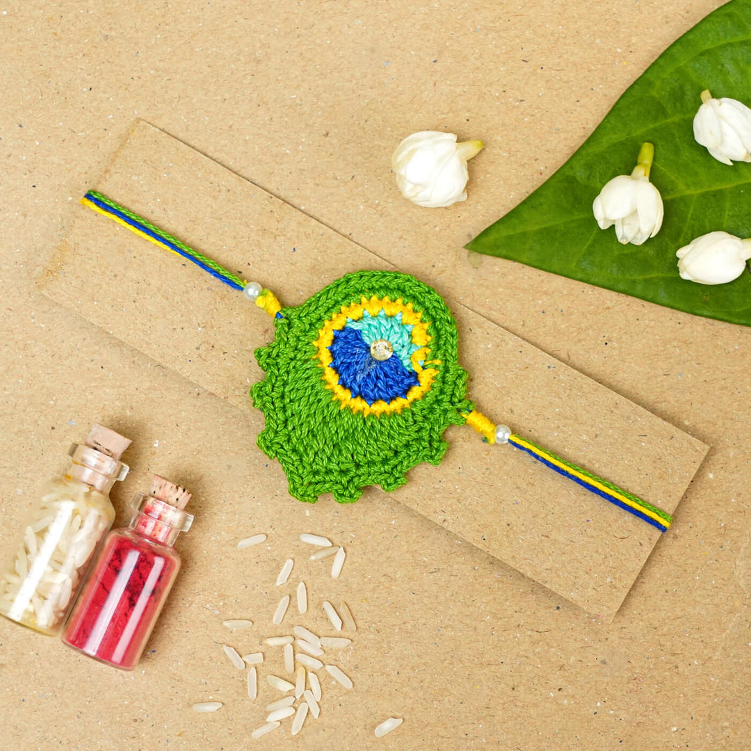 Handmade Crochet Peacock Feather Cotton Rakhi With Roli Chawal