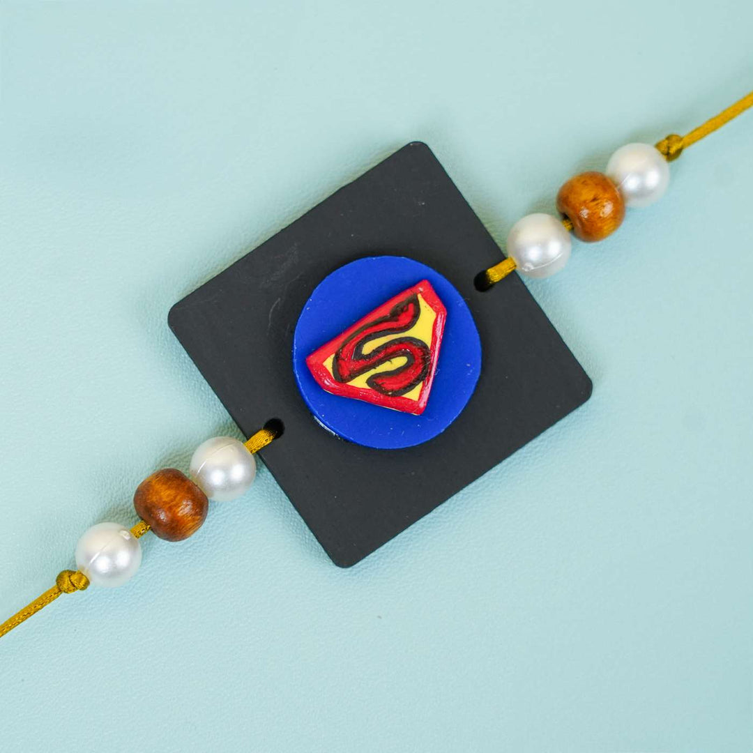 Handmade Miniature Clay Superman Kids Rakhi With Roli Chawal