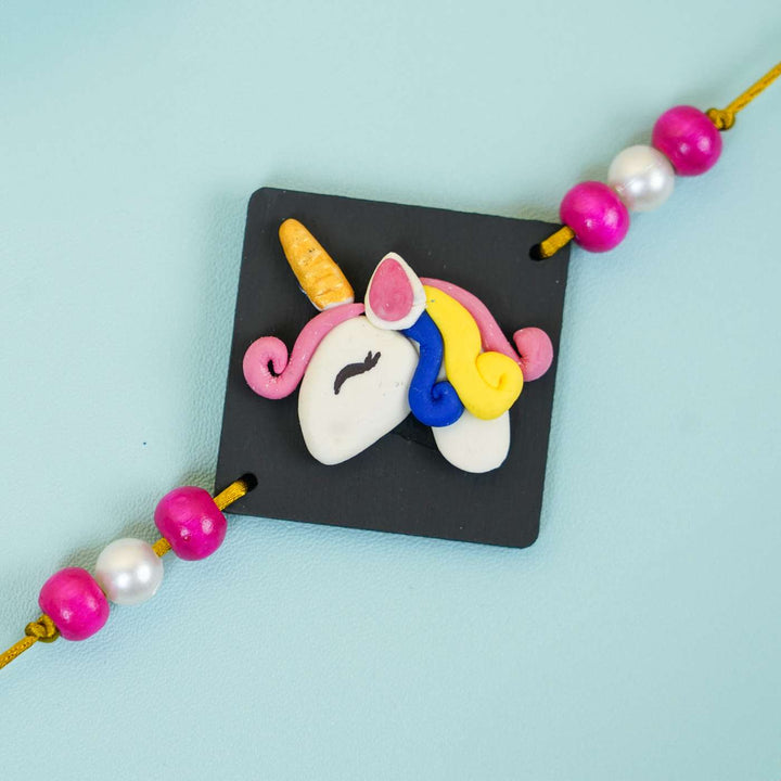 Handmade Miniature Clay Unicorn Kids Rakhi With Roli Chawal