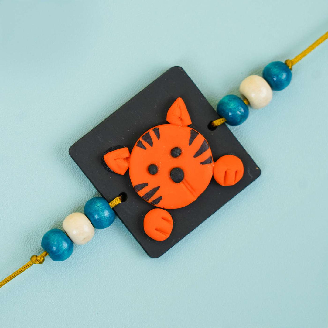 Handmade Miniature Clay Tiger Themed Kids Rakhi With Roli Chawal