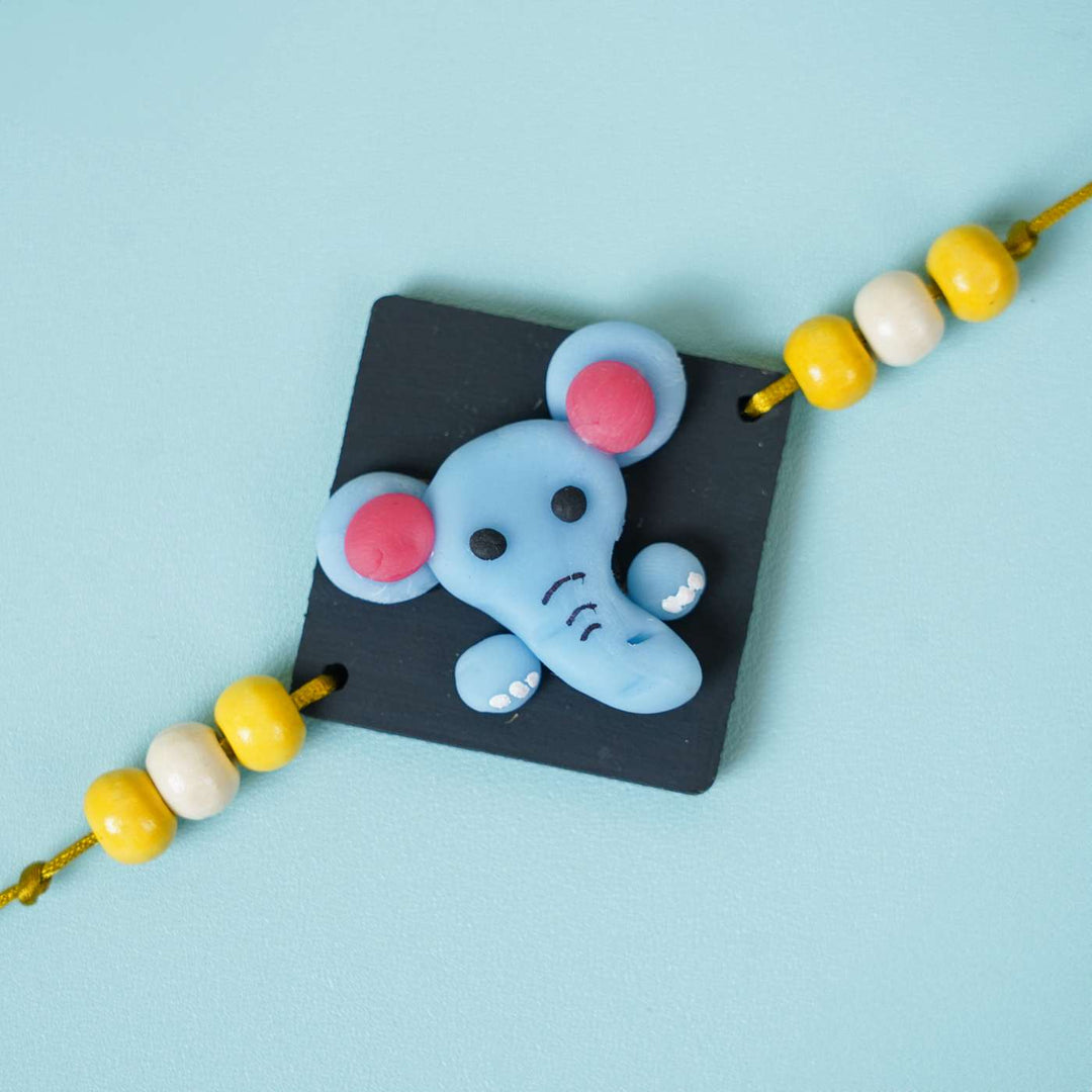 Handmade Miniature Clay Elephant Themed Kids Rakhi With Roli Chawal