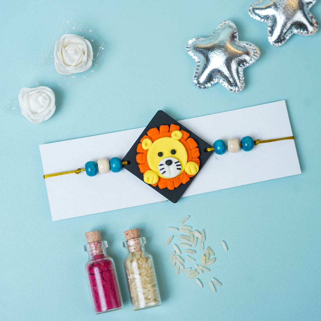 Handmade Miniature Clay Lion Themed Kids Rakhi With Roli Chawal