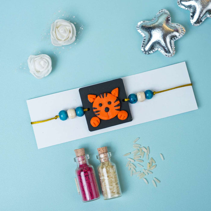 Handmade Miniature Clay Tiger Themed Kids Rakhi With Roli Chawal