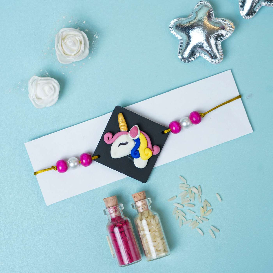 Handmade Miniature Clay Unicorn Kids Rakhi With Roli Chawal