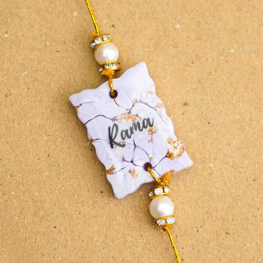 Personalized Handmade Lavendar Resin Rakhi With Roli Chawal