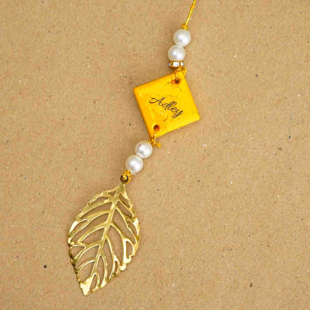 Personalized Handmade Yellow Resin Lumba Rakhi for Bhabhi With Roli Chawal